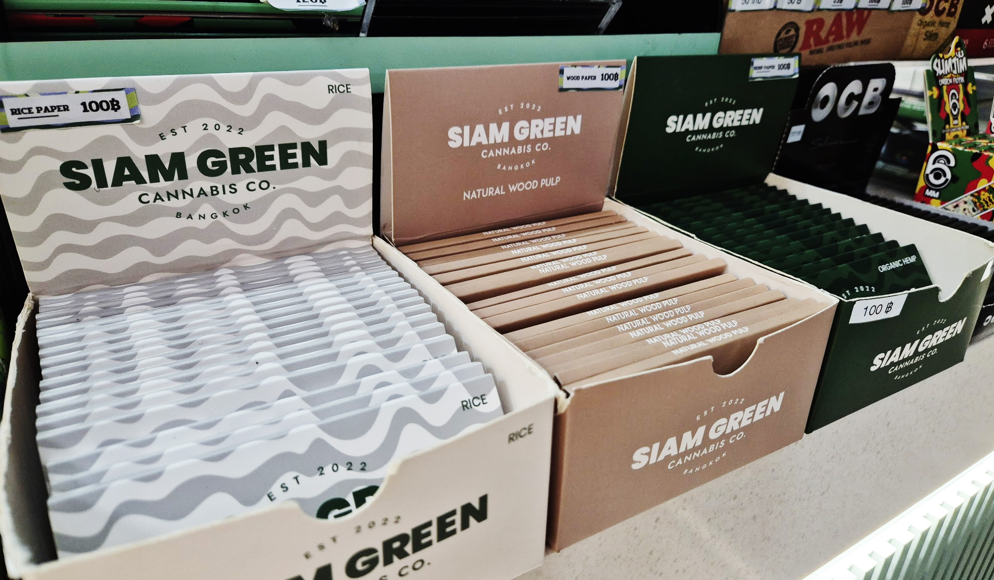 CBD drinks edibles and non-alcoholic beverages display case at Siam Green Bangkok