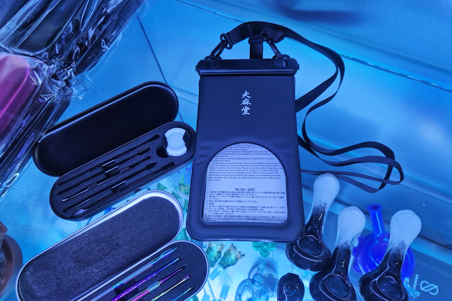 Original accessories at TAIMATON cannabis dispensary — lighter holders, waterproof pouches, and other Pattaya-ready items