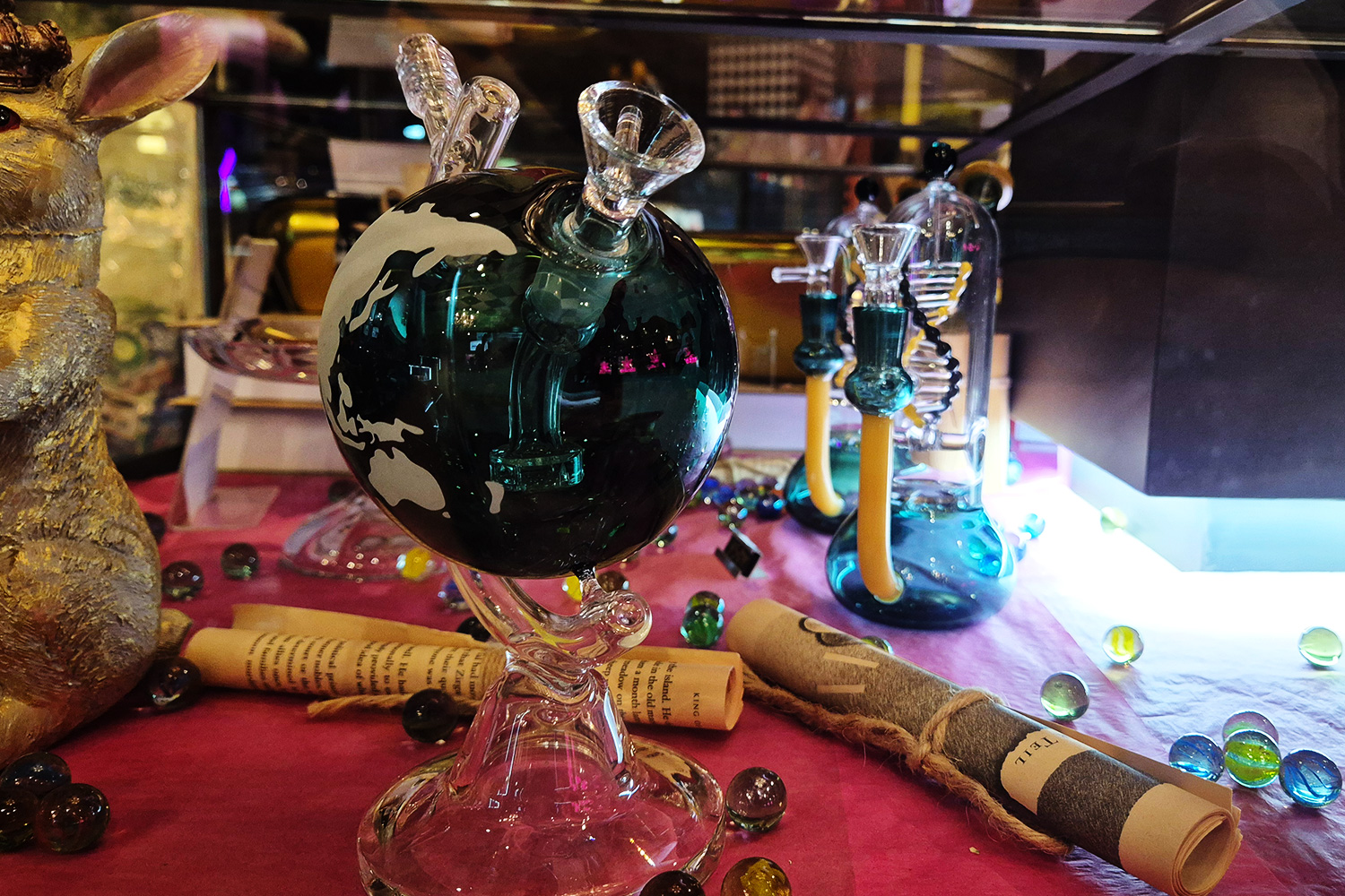 Globe-motif water pipe — decorative and functional bong at Wonderland Bangkok