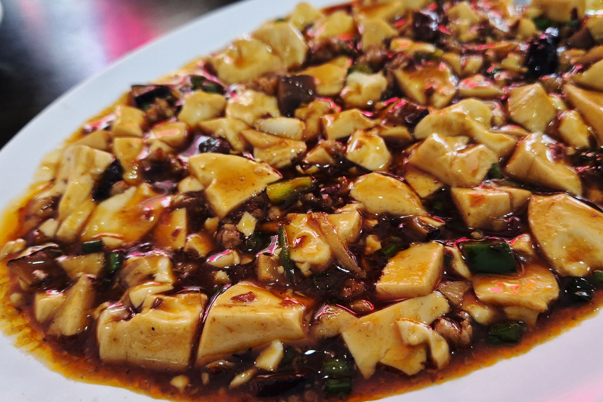 Mapo tofu coated in a rich, thick sauce ordered at Beijing Restaurant (Khrua Paking)