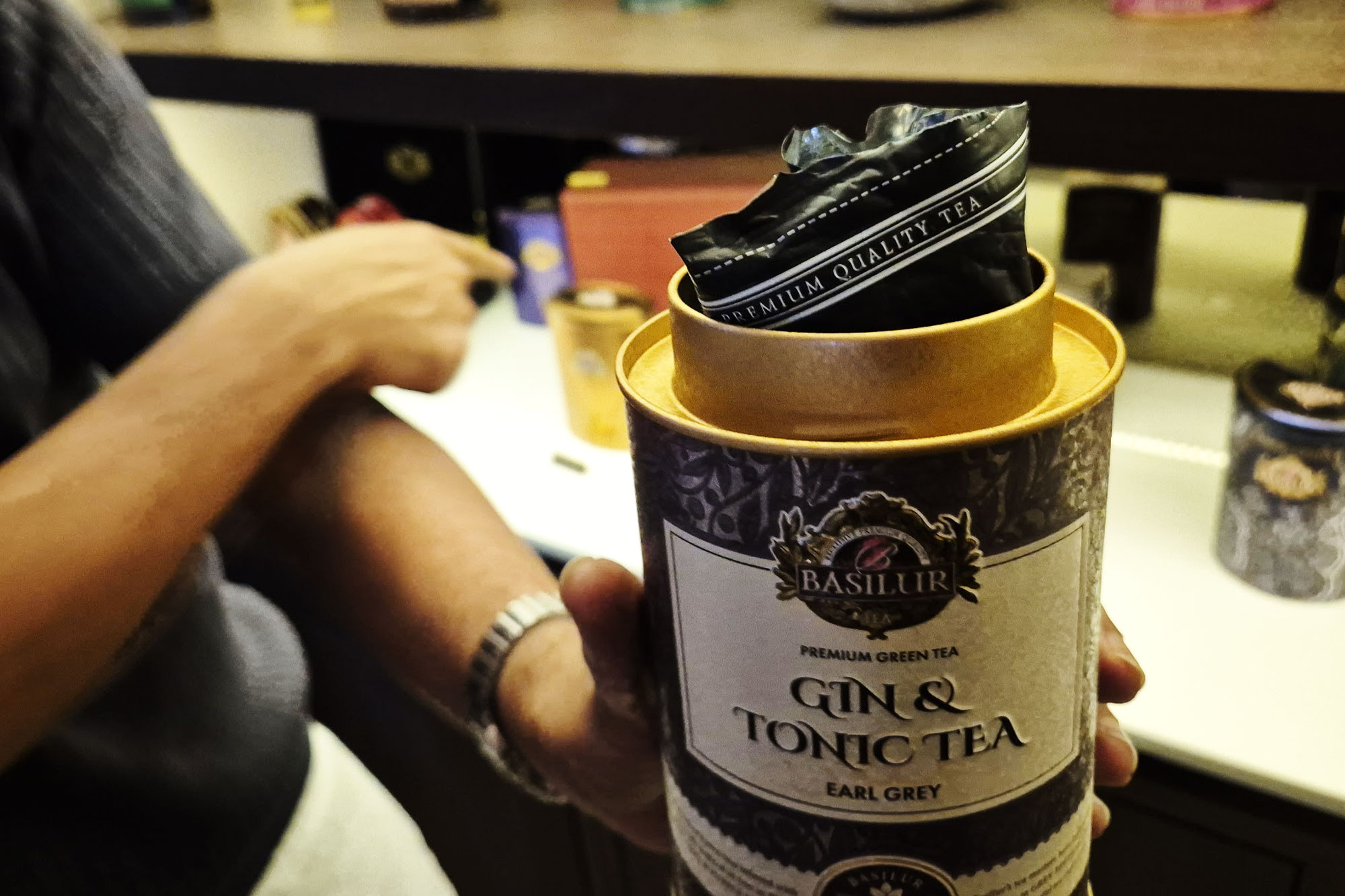 Flower stored in reused tea tins at Casa Verde BKK